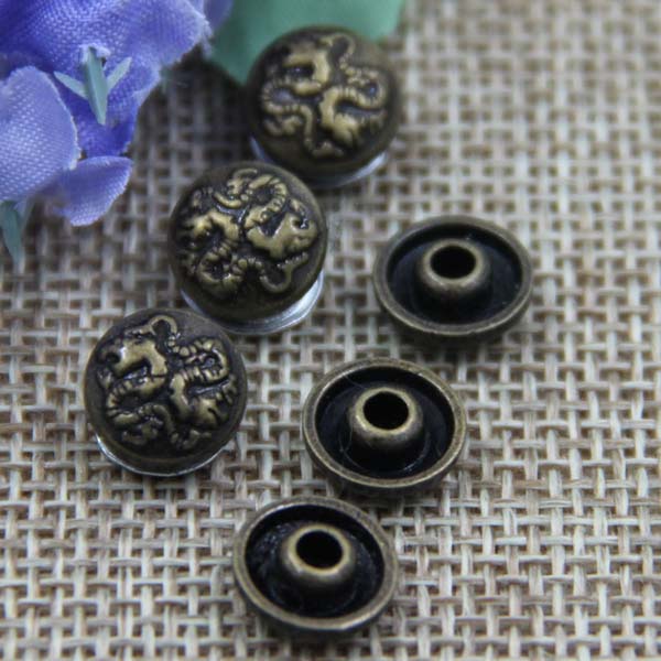 G016 Double Dragon Bronze Rivet 9mm 100pcs/bag