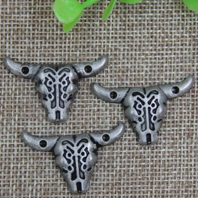 G067 Cow Head Sew Spikes 33x22mm 100pcs/bag