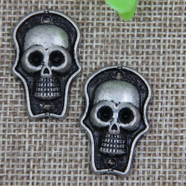 G090 Skull Sew Spikes 28x18mm 100pcs/bag