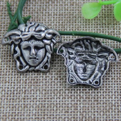 G096 Women Head Sew Spikes 28x23mm 100pcs/bag