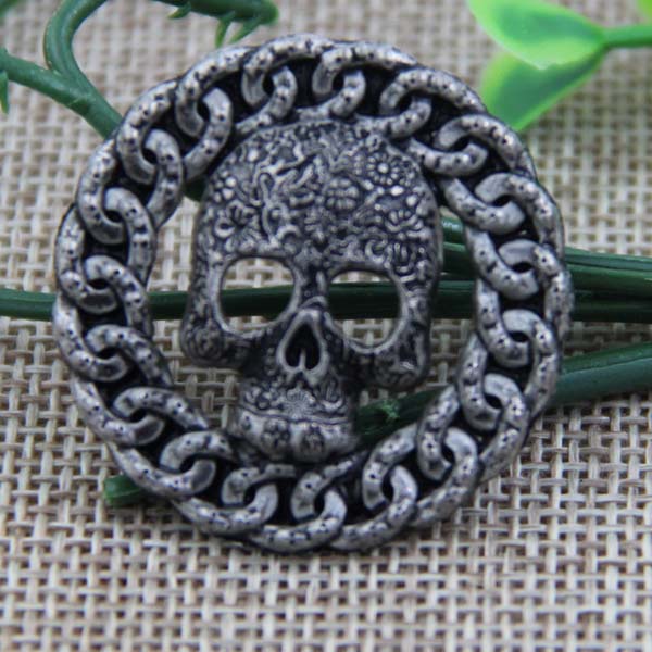 G076 Hollow Skull Sew Spikes 34mm 100pcs/bag