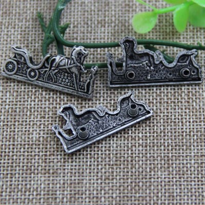 G086 Horse Drawn Cart Sew Spikes 35x18mm 100pcs/bag