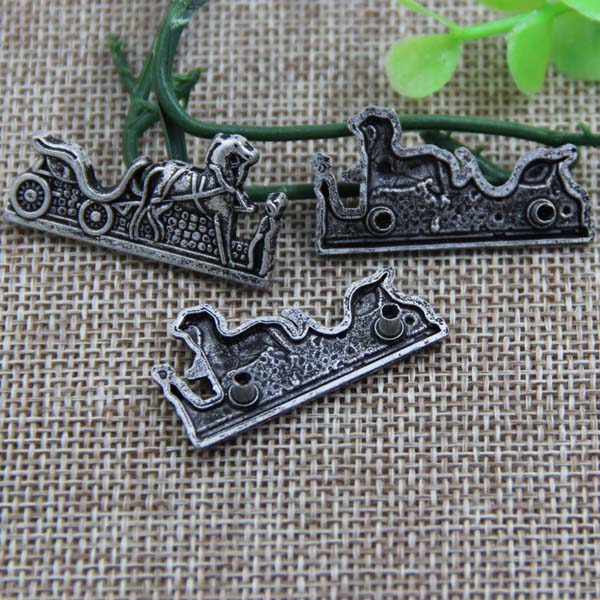 G086 Horse Drawn Cart Sew Spikes 35x18mm 100pcs/bag