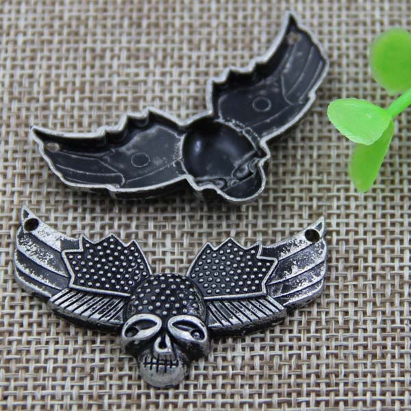 G087 Flying Insects Skull Sew Spikes 43x26mm 100pcs/bag