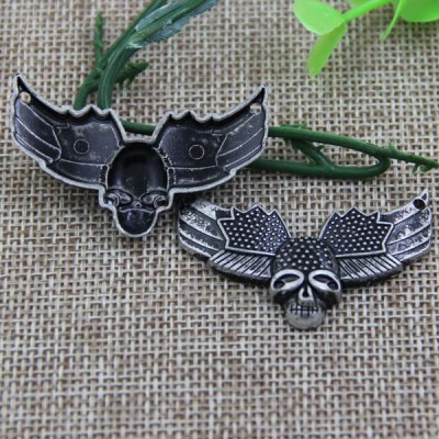 G087 Flying Insects Skull Sew Spikes 43x26mm 100pcs/bag