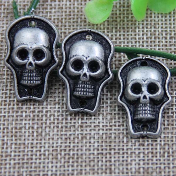 G090 Skull Sew Spikes 28x18mm 100pcs/bag