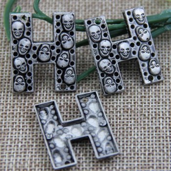 G095 Letter Skull Sew Spikes 27mm A,27mm C,25mm D,24mm H,21mm L,24mm N 100pcs/bag