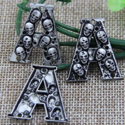G095 Letter Skull Sew Spikes 27mm A,27mm C,25mm D,24mm H,21mm L,24mm N 100pcs/bag