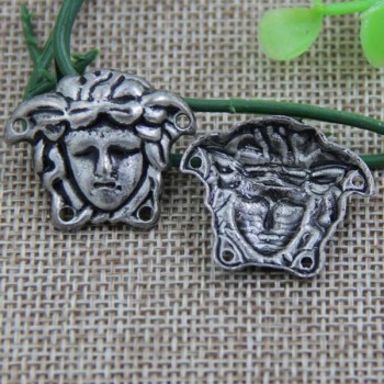 G096 Women Head Sew Spikes 28x23mm 100pcs/bag