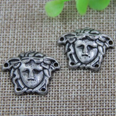 G096 Women Head Sew Spikes 28x23mm 100pcs/bag