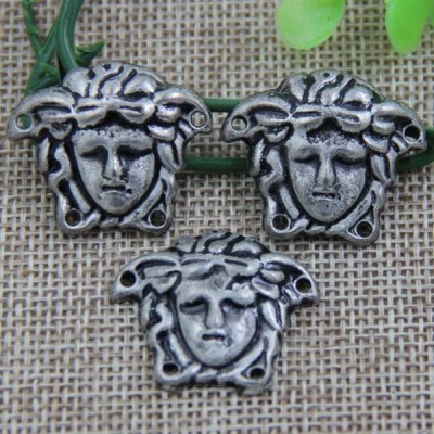 G096 Women Head Sew Spikes 28x23mm 100pcs/bag